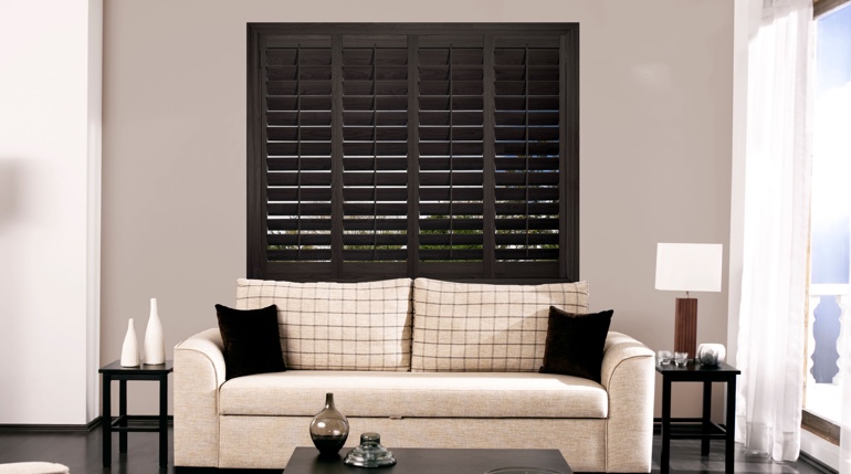 Southern California living room with plantation shutters.